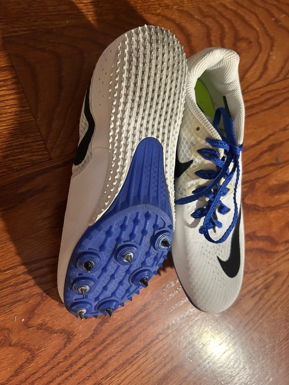 Nike Women White and Blue Track Spikes
